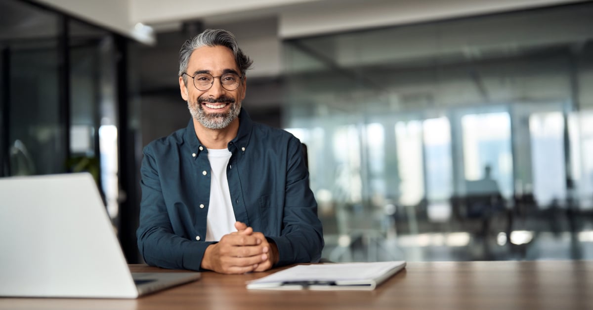 Business owner sitting at desk