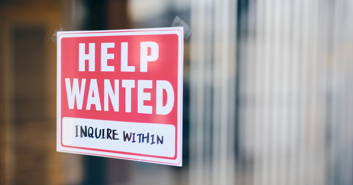 A business help wanted sign illustrates the skill gap among IT staff, especially those with advanced cybersecurity skills.