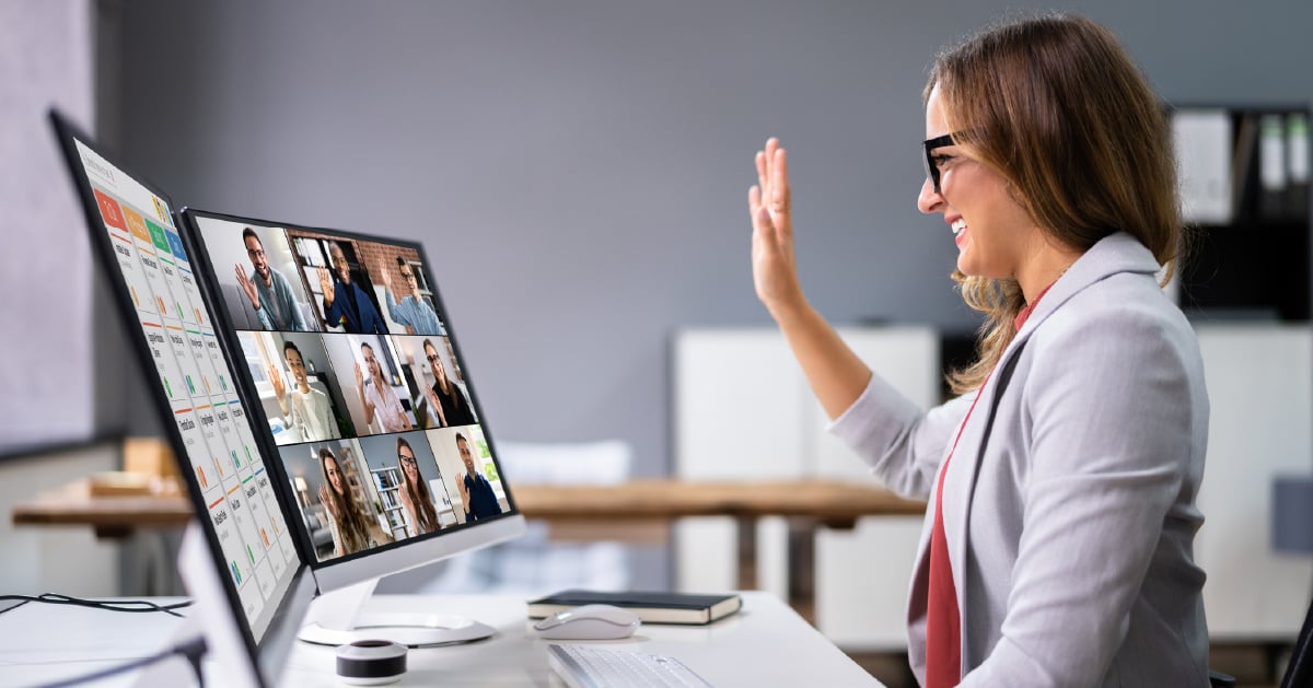 A remote female worker uses UCaaS to connect with her team members across the country.